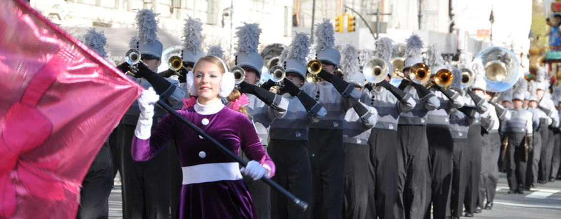 Marching in the Macy’s Thanksgiving Day Parade with Music Travel Consultants