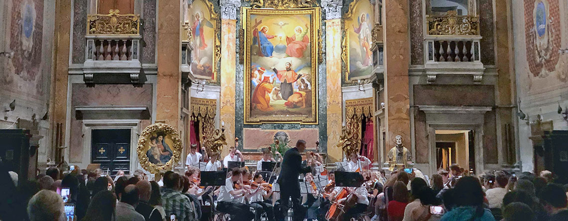 The Avon High School Orchestra from Indiana performs for a packed house in Rome at the Oratory of San Francesco Saverio del Caravita.