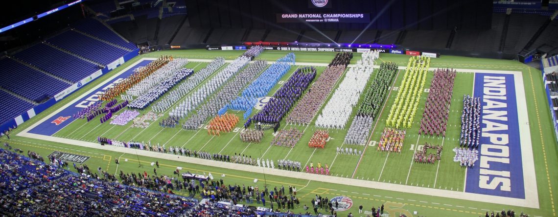 Overhead view of bands lined up on the field of Lucas Oil Stadium before Grand National Championships finals awards