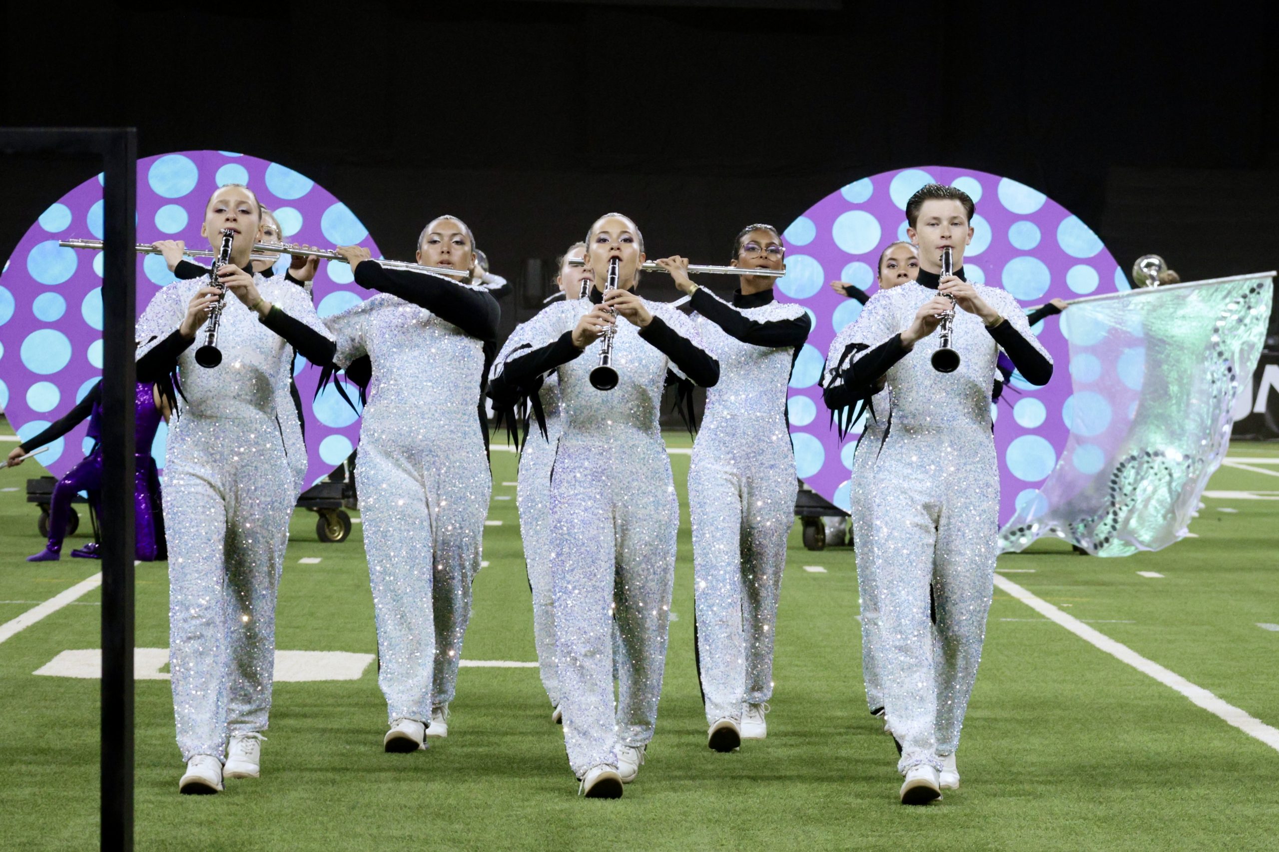 Band members from Bentonville HS performing on the field at Lucas Oil Stadium