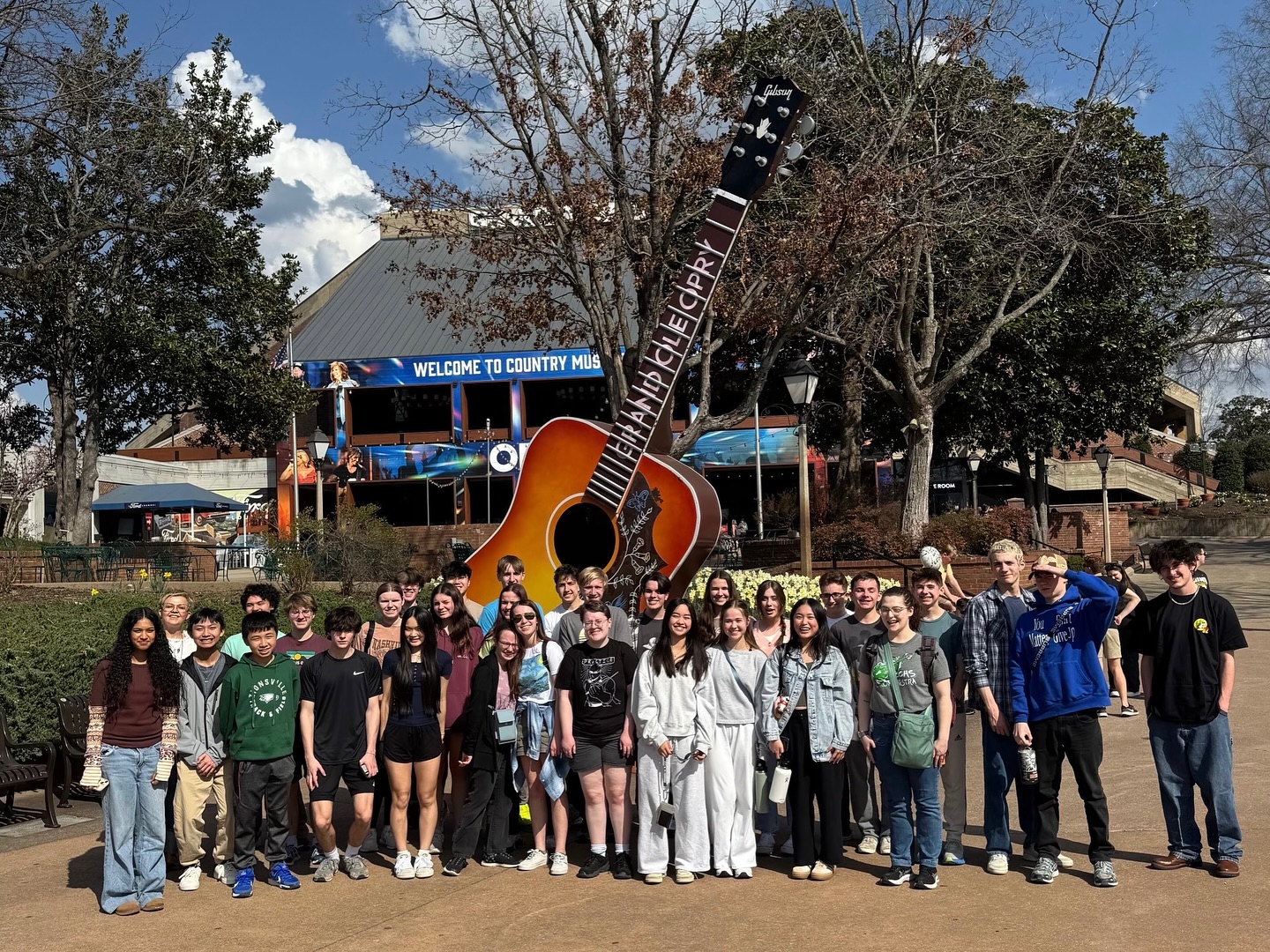 Zionsville HS of Indiana posing in front of Guitar statue